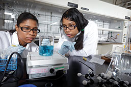 Photo of students in the lab. Link to Gifts That Pay You Income